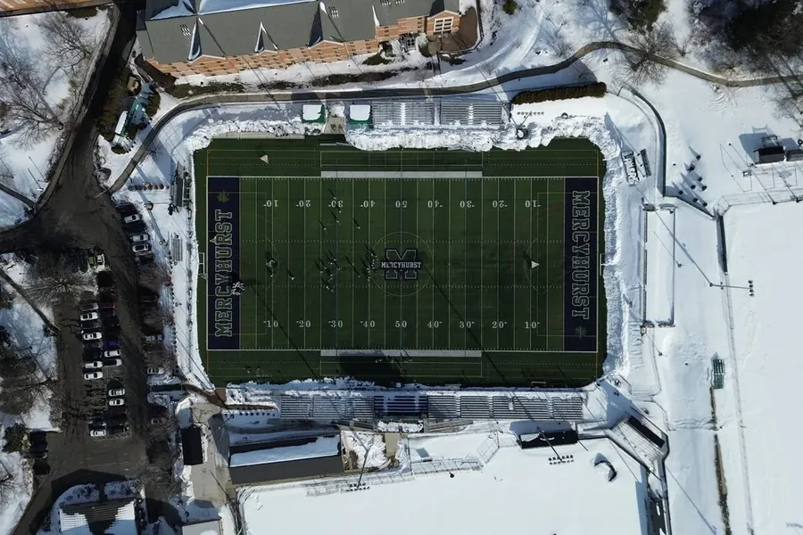 University stadium under snow photographed from above