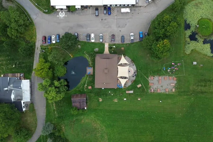 Vineyard estate house and outbuildings photographed from the air